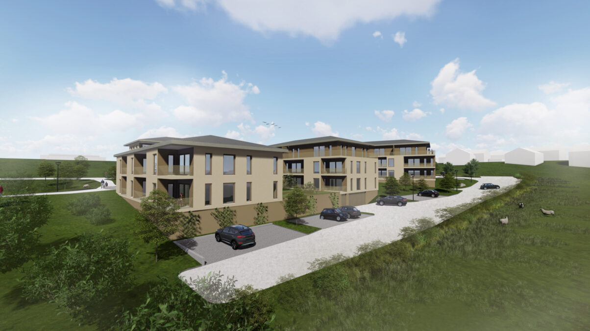 moderne seniorenwohnanlage mit grünflächen und zufahrtsweg