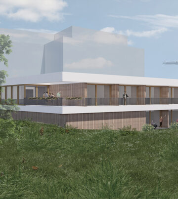 flacher baukörper mit holzfassade